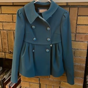Blue dress coat with buttons and pleats
